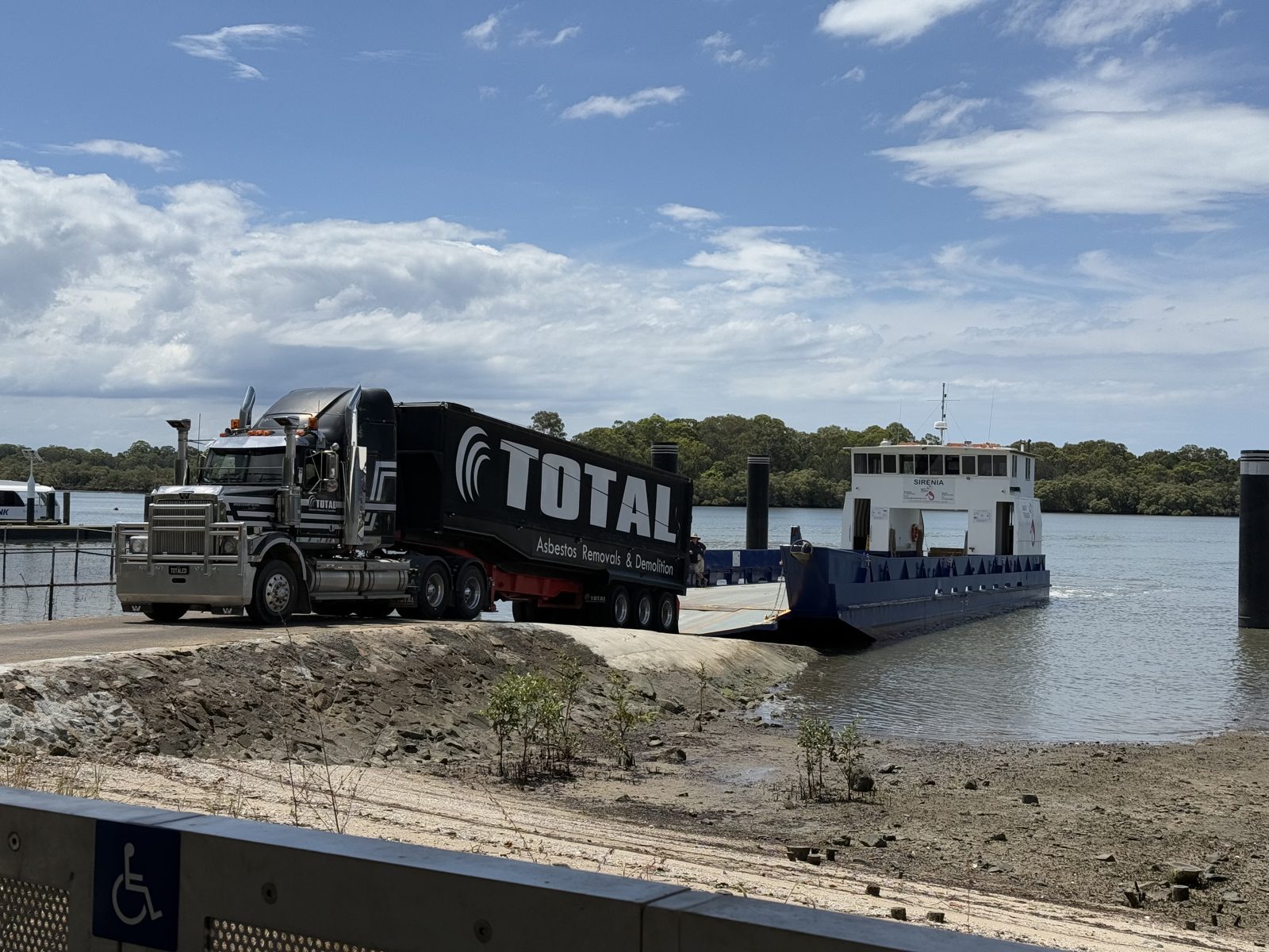 Remote Asbestos Removal at Russell Island State School 2 Total Asbestos truck driving off the barge at Russell Island